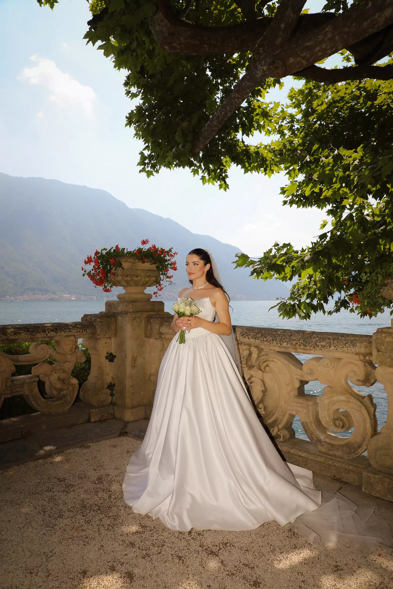 Elegant bridal portrait at Villa del Balbianello in Lake Como – photographed by Nadia Fraqair