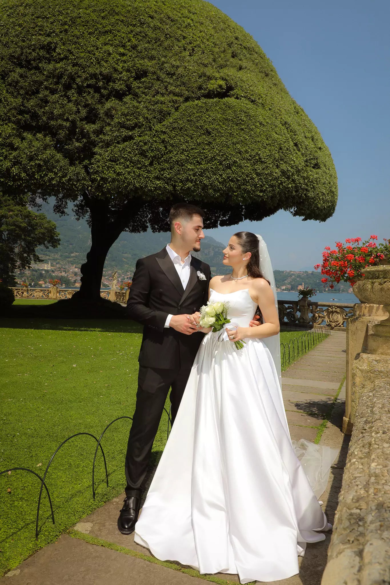 Romantic wedding portraits on the terraces of Villa del Balbianello overlooking Lake Como