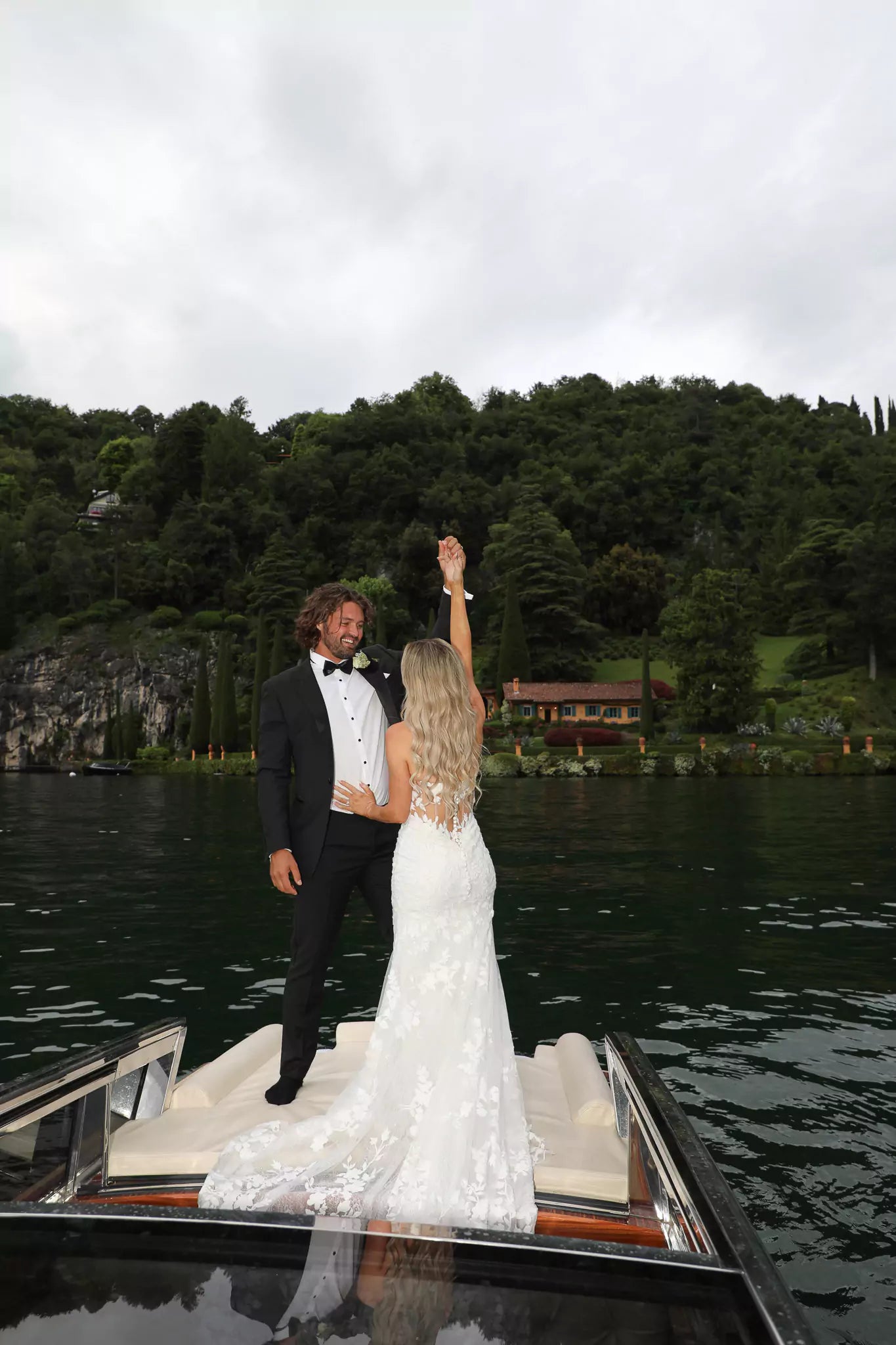 Luxury wedding photography at Villa La Cassinella with private boat photo shoot on Lake Como – captured by Nadia Fraqair